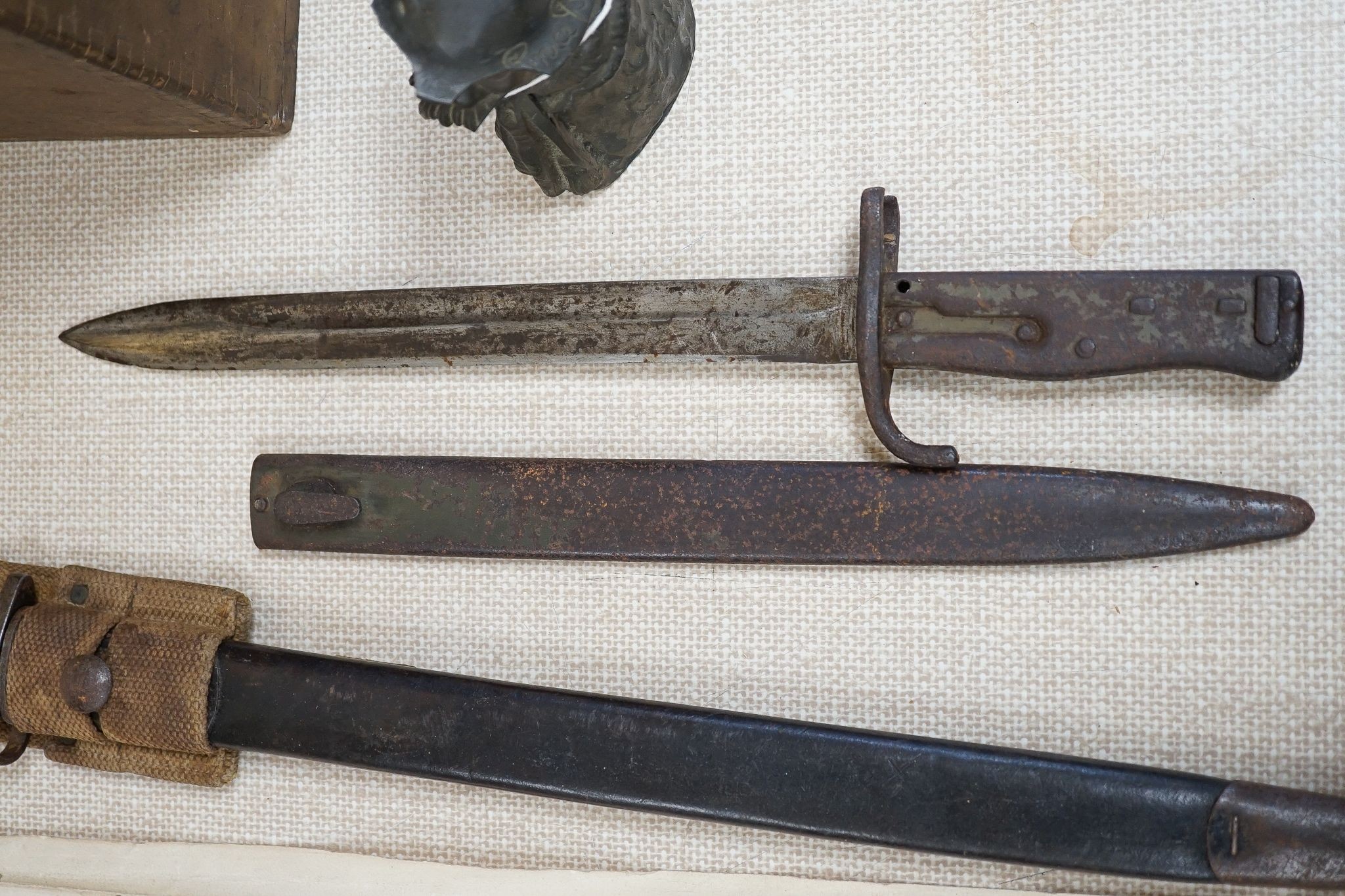 A British WWI Short & Mason compass, two bayonets, cartridge case, Lucas morse code, etc.